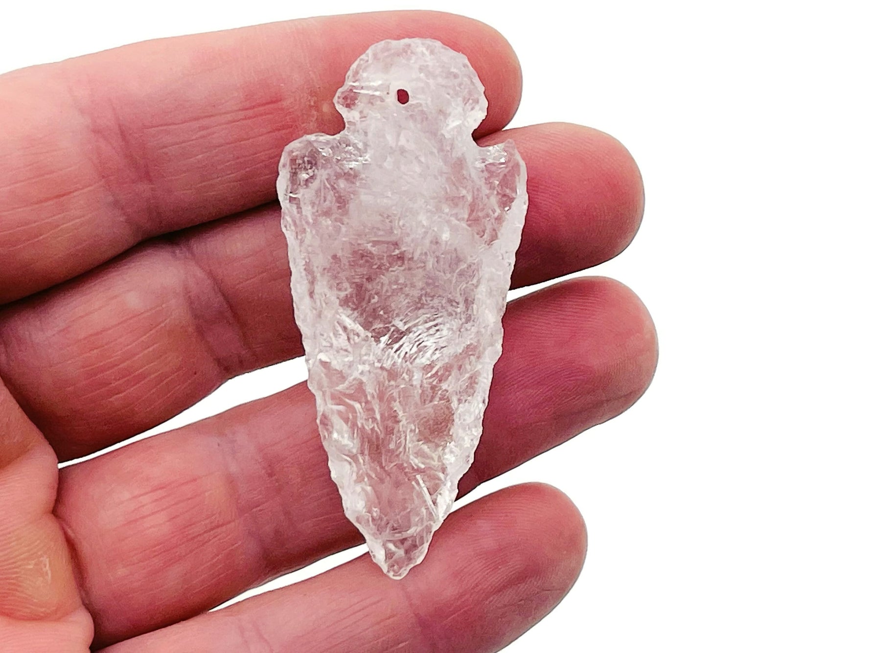 Clear Quartz arrow point pendant from GemstoneGO, drilled crystal jewelry piece with a polished, natural quartz arrow shape.