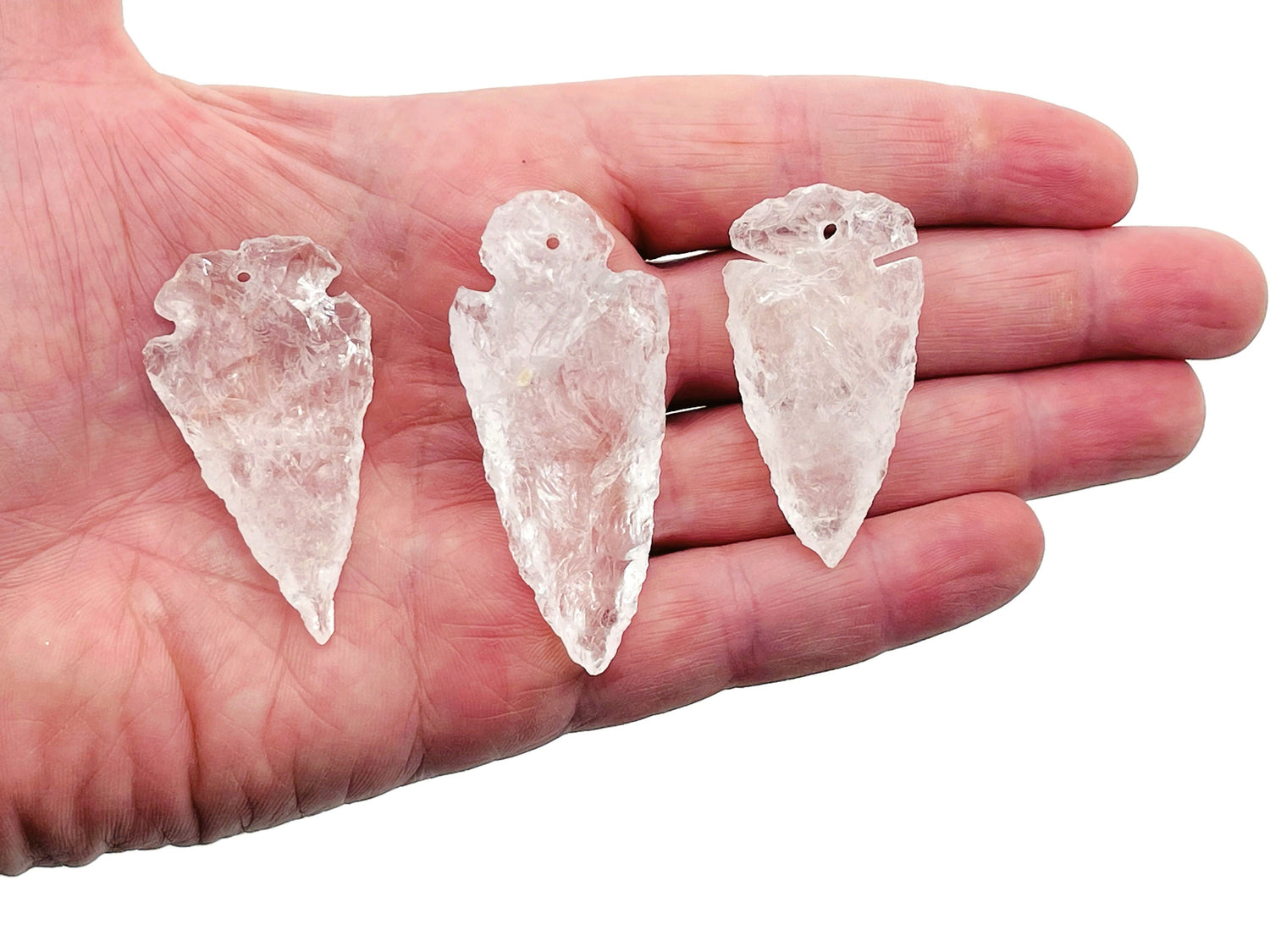 Clear quartz arrow point pendant from GemstoneGO, drilled crystal jewelry with a polished, pointed crystal design.