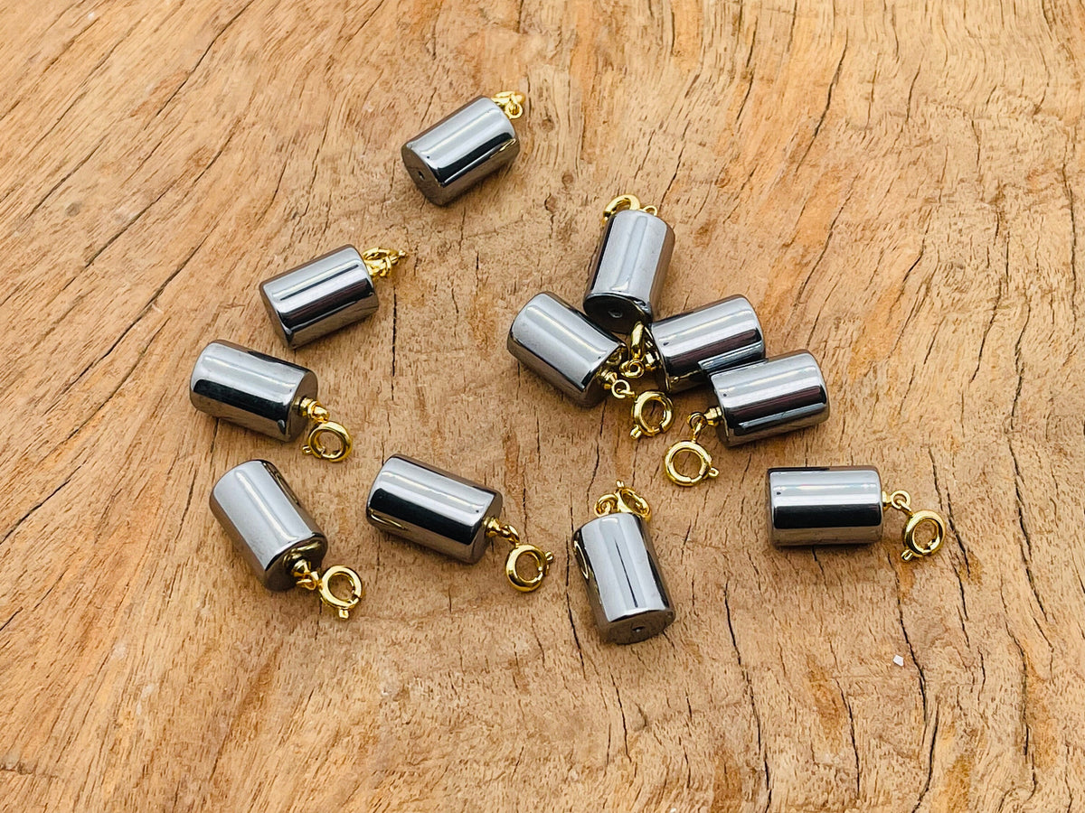 Terahertz crystal pendant from GemstoneGO, showcasing a polished gemstone for jewelry making on a neutral background.