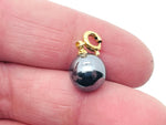 Terahertz Ball gemstone pendant from GemstoneGO, showcasing a polished, spherical jewelry-making gemstone in vibrant colors.