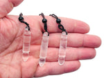Clear quartz bullet crystal necklace from GemstoneGO featuring a sleek, polished quartz pendant on a delicate chain.