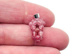 Strawberry Quartz Grape Crystal Pendant by GemstoneGO, featuring a detailed crystal grape design on a silver setting.