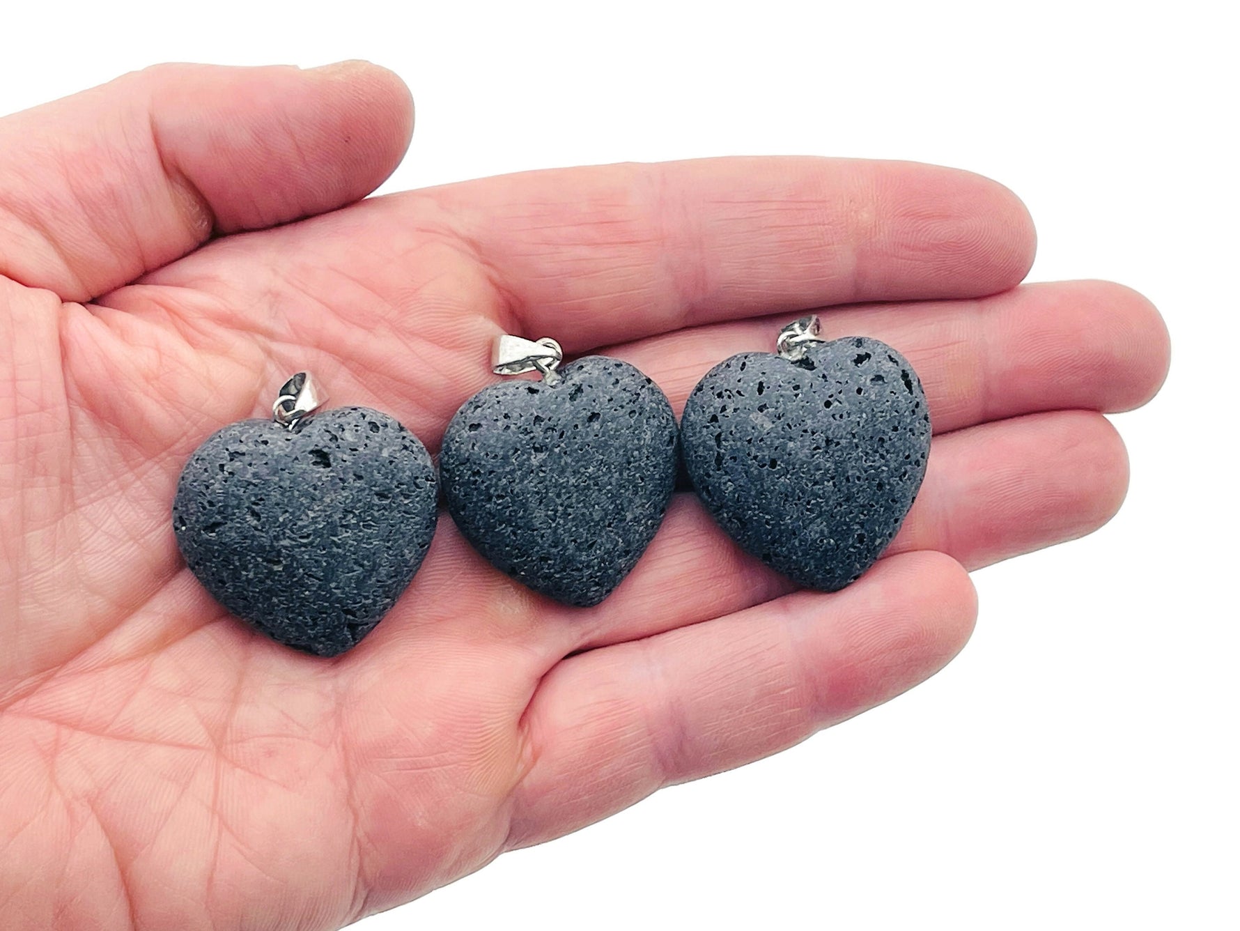 Lava heart-shaped gemstone pendant from GemstoneGO featuring a spiritual stone design on a silver chain.