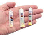 Chakra Selenite sticks pendant from GemstoneGO featuring a clear crystal healing pendant with a silver bail, on a white background.