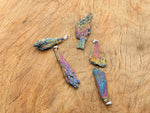 Rainbow Kyanite fan crystal pendant with titanium accents, showcasing vibrant, layered gemstone jewelry on a delicate chain.