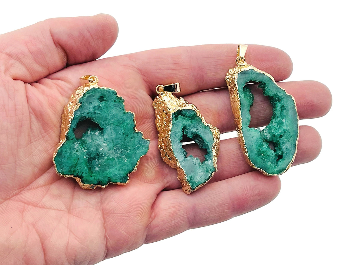 Green agate geode druzy slice pendant from GemstoneGO, showcasing vibrant green crystal formations and a polished stone edge.