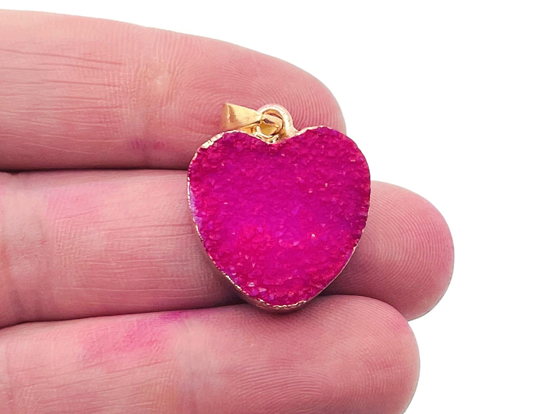 Pink agate heart geode pendant with druzy slice, gemstone jewelry featuring a natural crystal pendant from GemstoneGO.