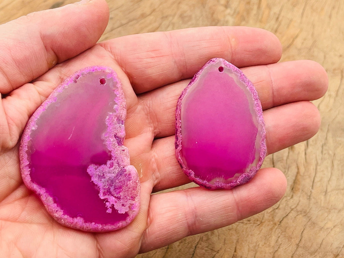 Pink Agate slice drilled pendant featuring a natural pink agate geode with a hole for jewelry making by GemstoneGO.