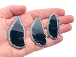 Agate slice drilled with hole, geode crystal pendant for jewelry making, featuring natural banding and gemstone details.