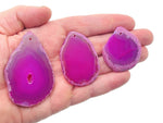 Agate slice drilled pendant with natural geode crystal, showcasing vibrant colors and unique pattern for jewelry making.