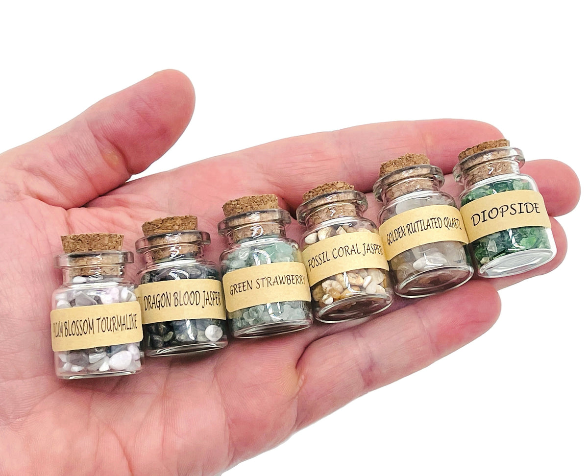 Small bottle of GemstoneGO Big Event 140 pcs gemstone chips, colorful semi-tumbled crystal energy stones for crafts and healing.