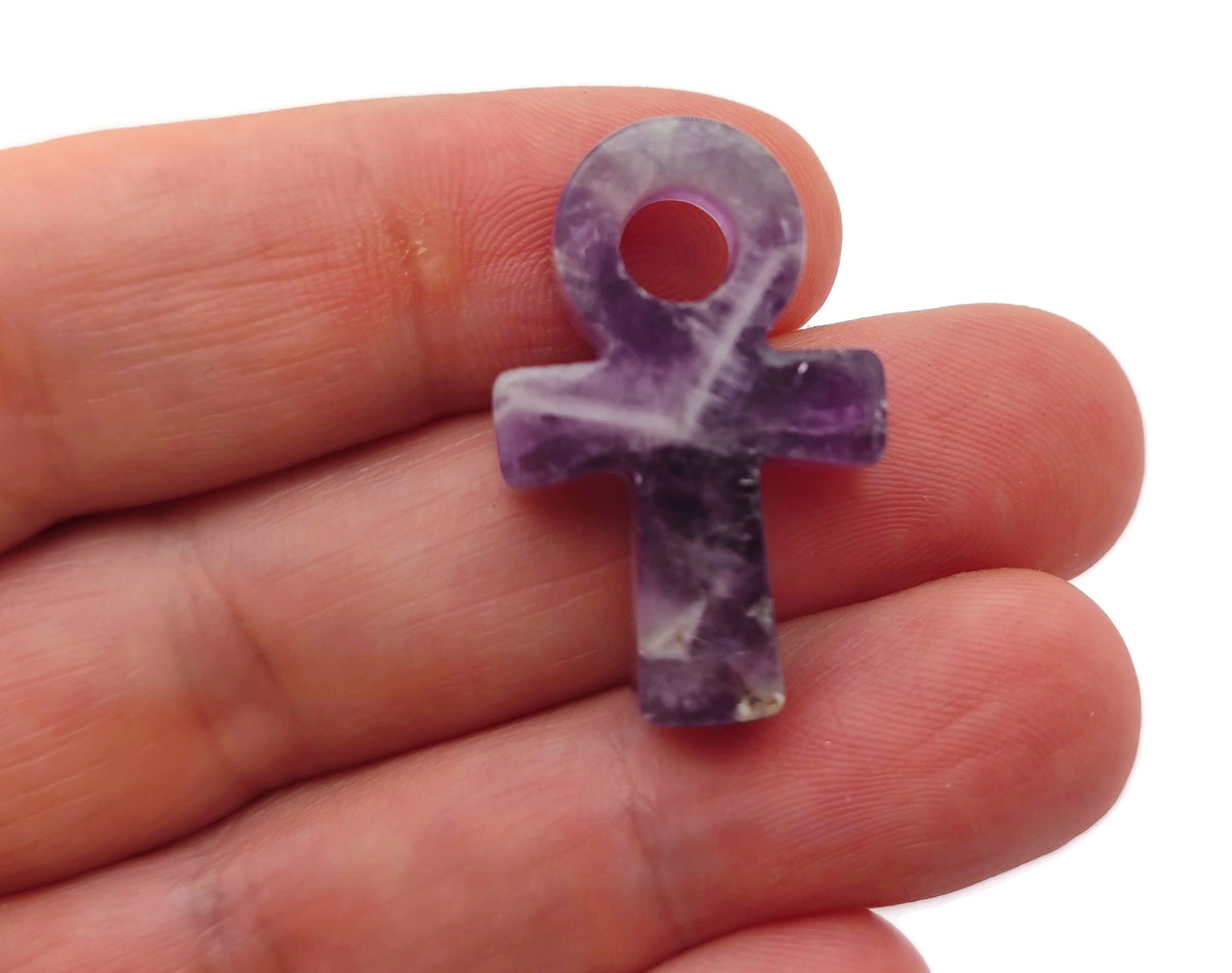 Amethyst Anka crystal carving by GemstoneGO showing a 30mm gemstone Ankh sculpture with purple amethyst hues.