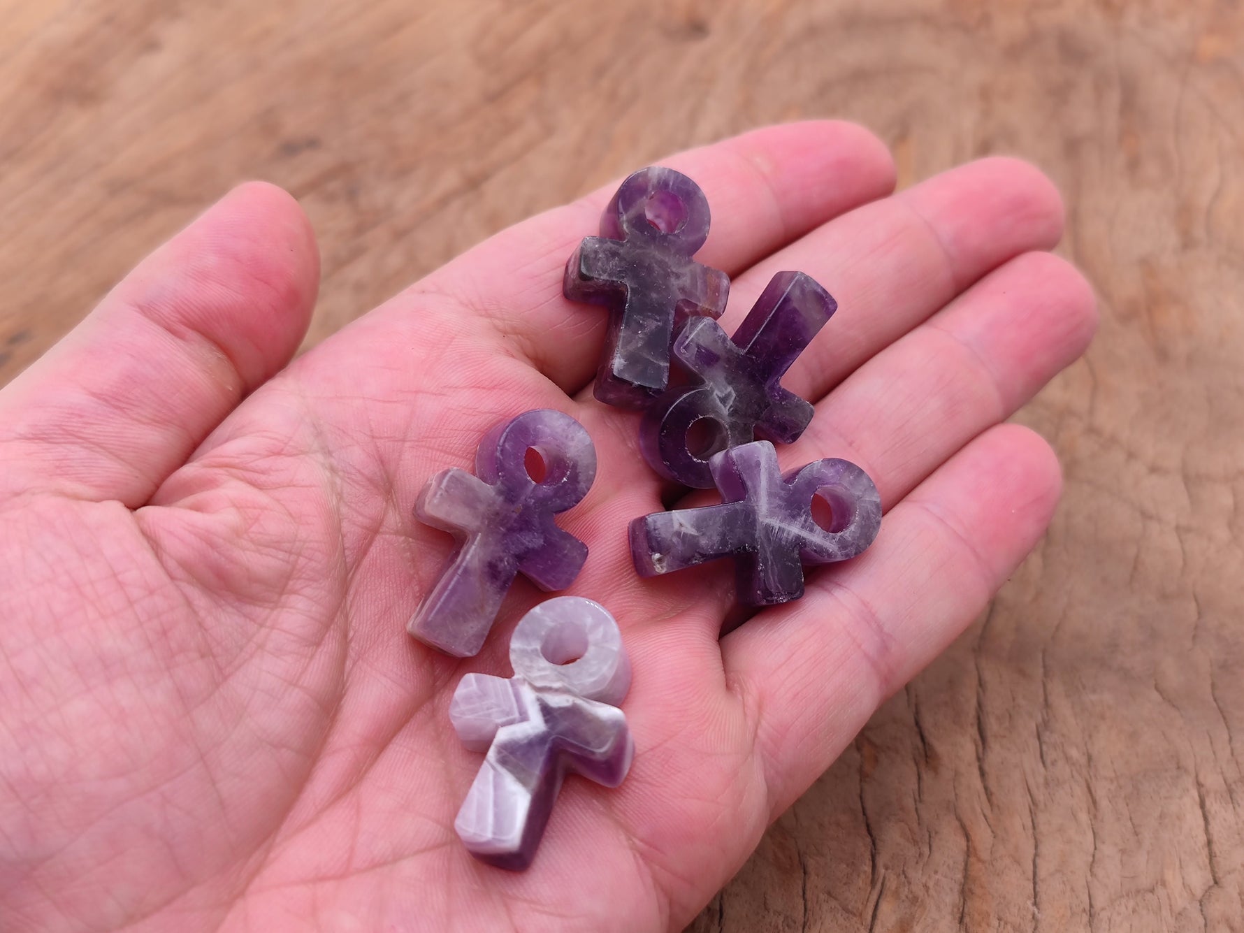 Amethyst Anka crystal carving from GemstoneGO, 30mm gemstone ankh symbol with purple amethyst hue, detailed gemstone craftsmanship.