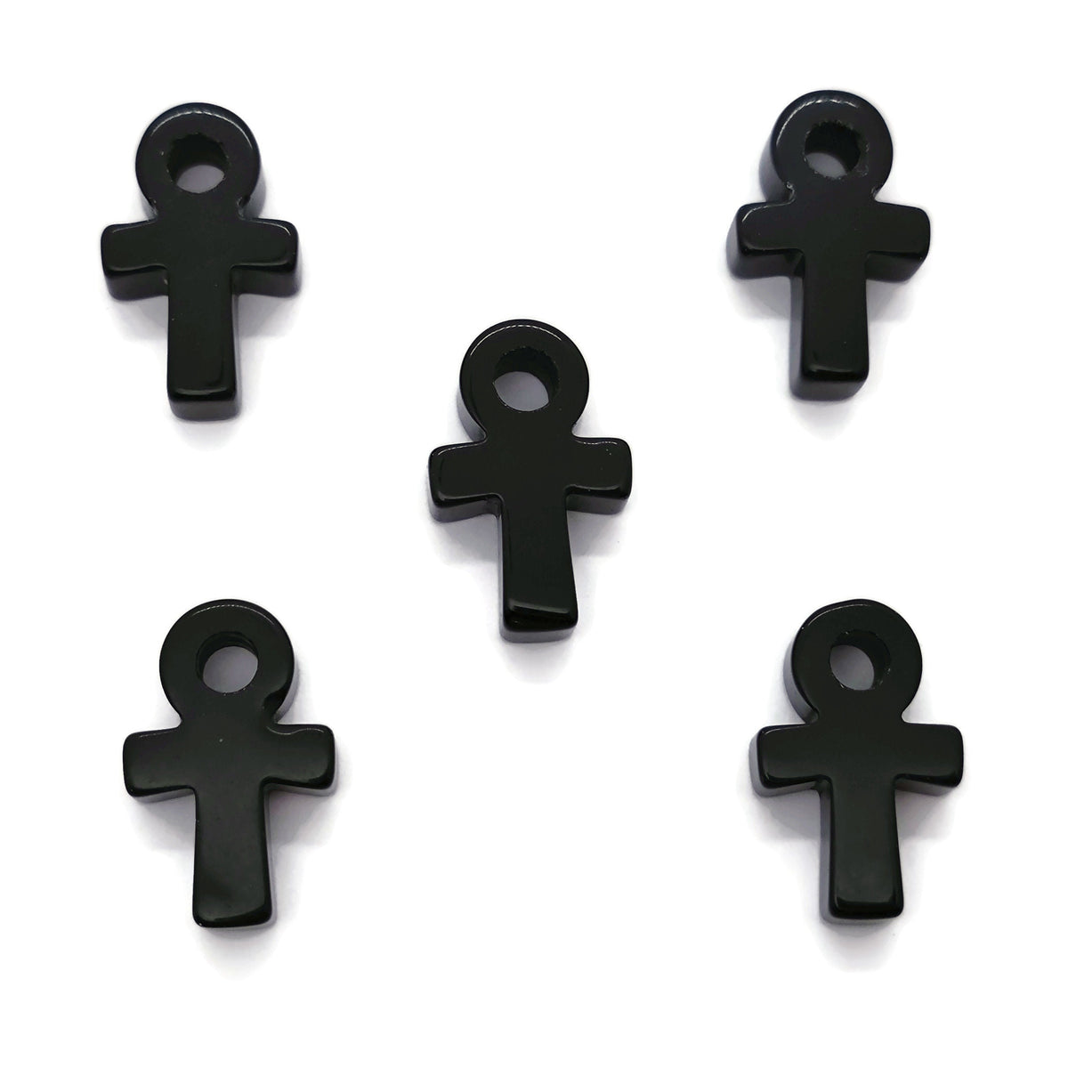 Obsidian Anka crystal carving with gemstone ankhs, 30mm size, crafted by GemstoneGO, detailed close-up of carved stone.
