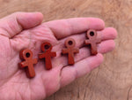 Red Jasper Anka crystal carving from GemstoneGO featuring a 30mm gemstone ankh symbol on a polished surface.