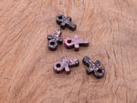 Rhodonite Anka crystal carving, gemstone ankh pendant, 30mm, with polished pink and black gemstone details.