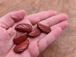 Red Jasper angel wing crystal pendant with hole charm, featuring detailed gemstone craftsmanship by GemstoneGO.