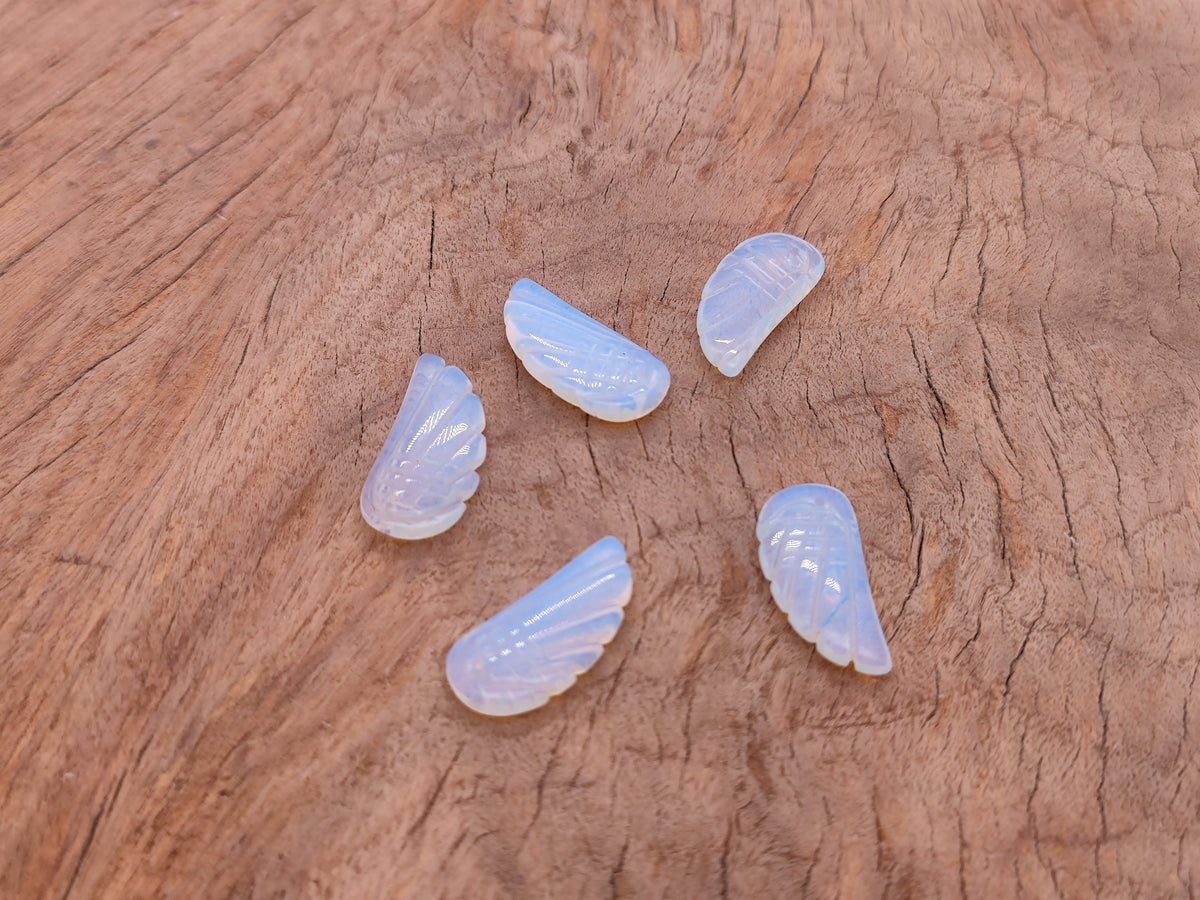 Opalite angel wing crystal pendant with hole charm, featuring a detailed angel wing design from GemstoneGO.
