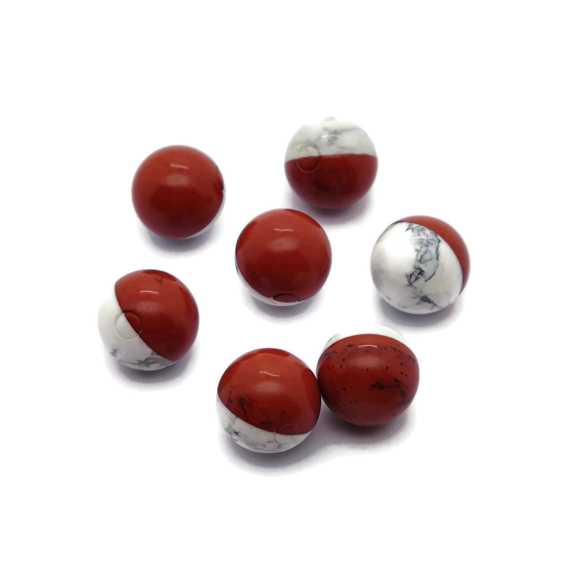 20mm PokeBall sphere gemstone made of Howlite and Red Jasper, featuring a crystal ball design with vibrant red accents.
