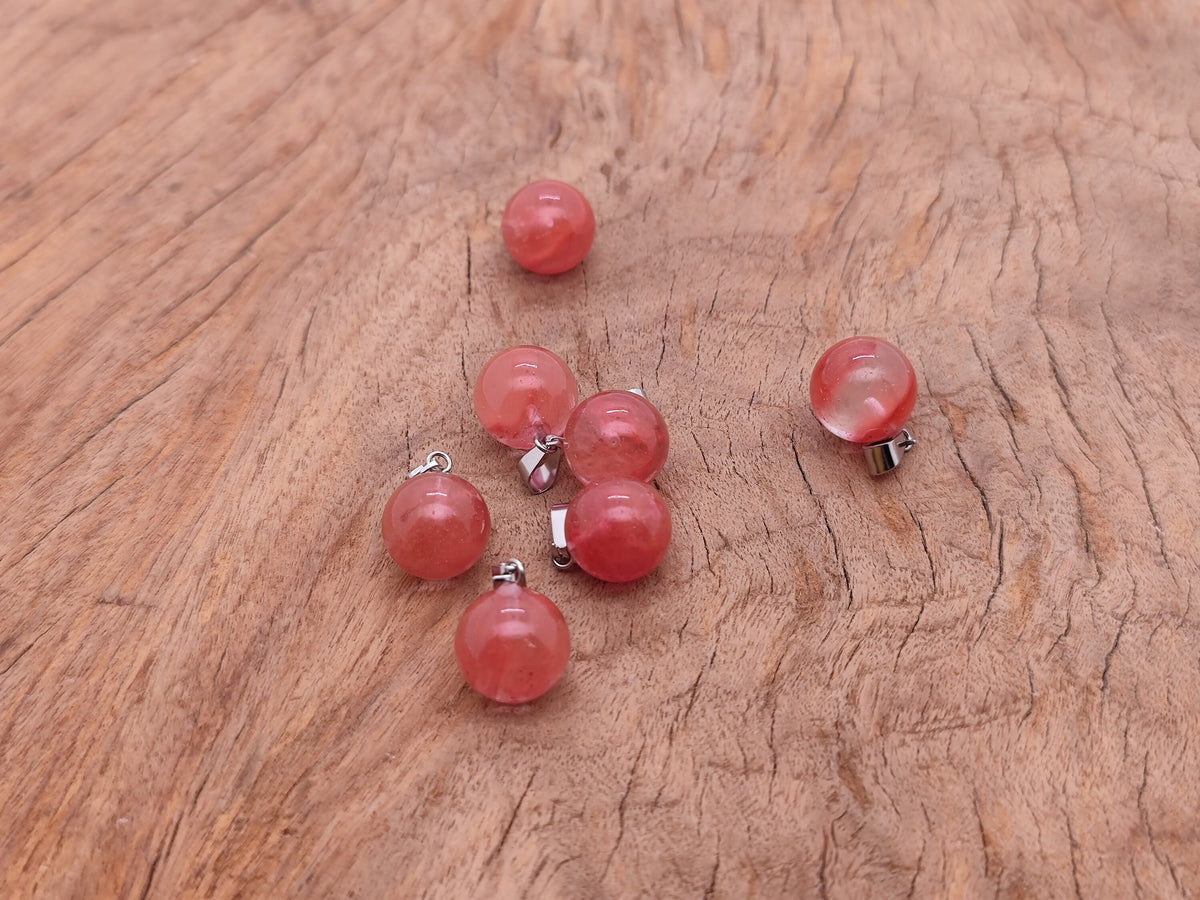 Cherry Quartz ball crystal pendant from GemstoneGO, round gemstone jewelry making pendant with polished cherry-colored quartz.