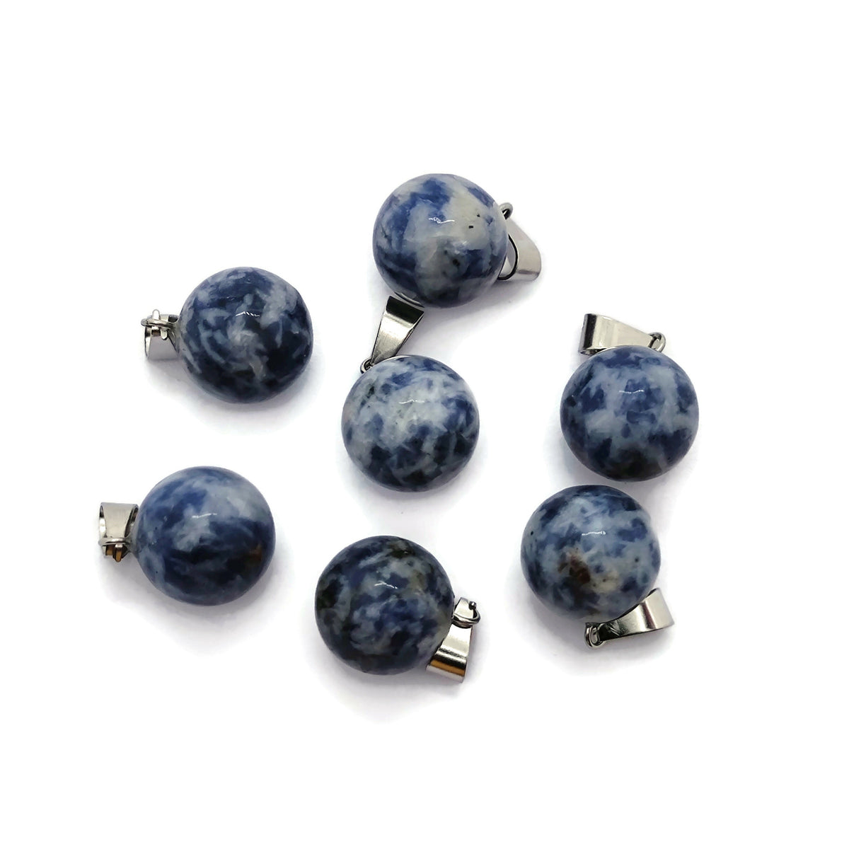 Blue Spot Jasper crystal ball pendant, round gemstone jewelry making accessory showcasing vibrant blue and natural stone patterns.