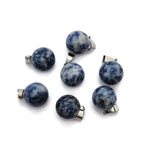 Blue Spot Jasper crystal ball pendant, round gemstone jewelry making accessory showcasing vibrant blue and natural stone patterns.
