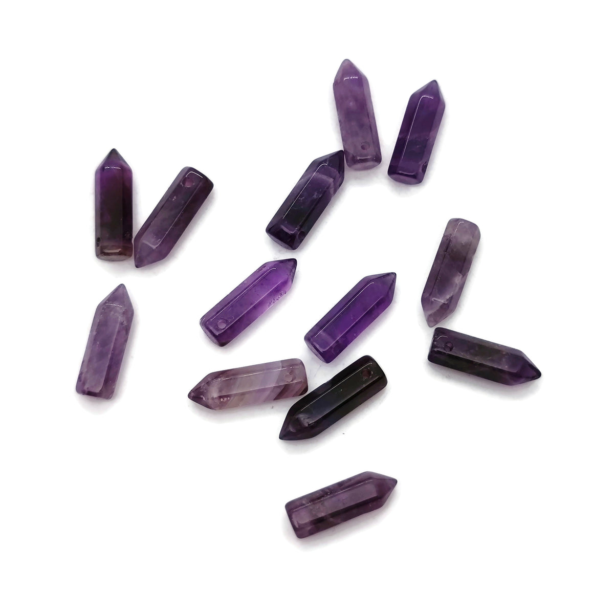 Amethyst point hole crystal pendant with drilled gemstone, showcasing purple Amethyst gemstone with natural crystal structure.