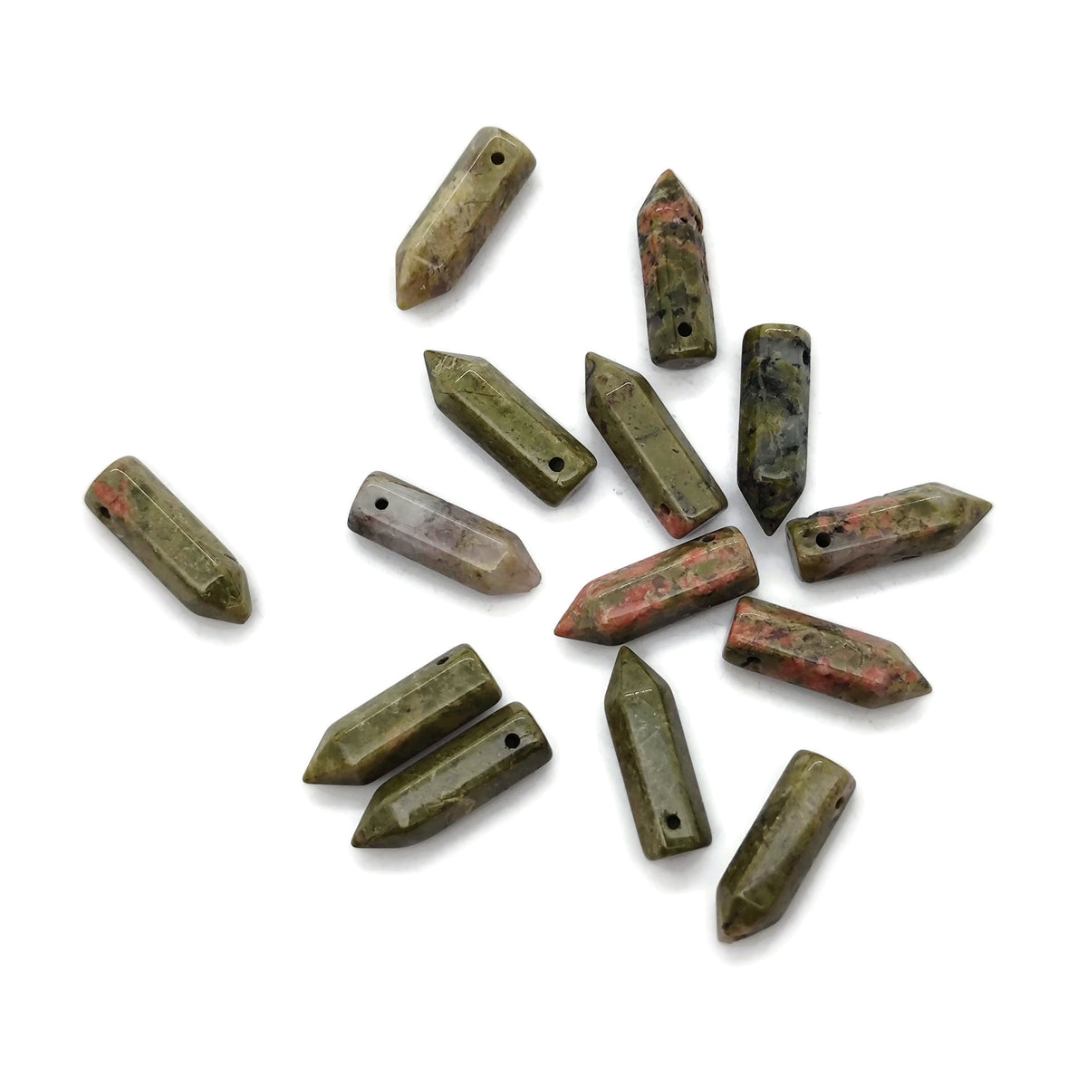 Unakite point hole crystal pendant from GemstoneGO showing a drilled green and pink gemstone crystal pendant on a white background.