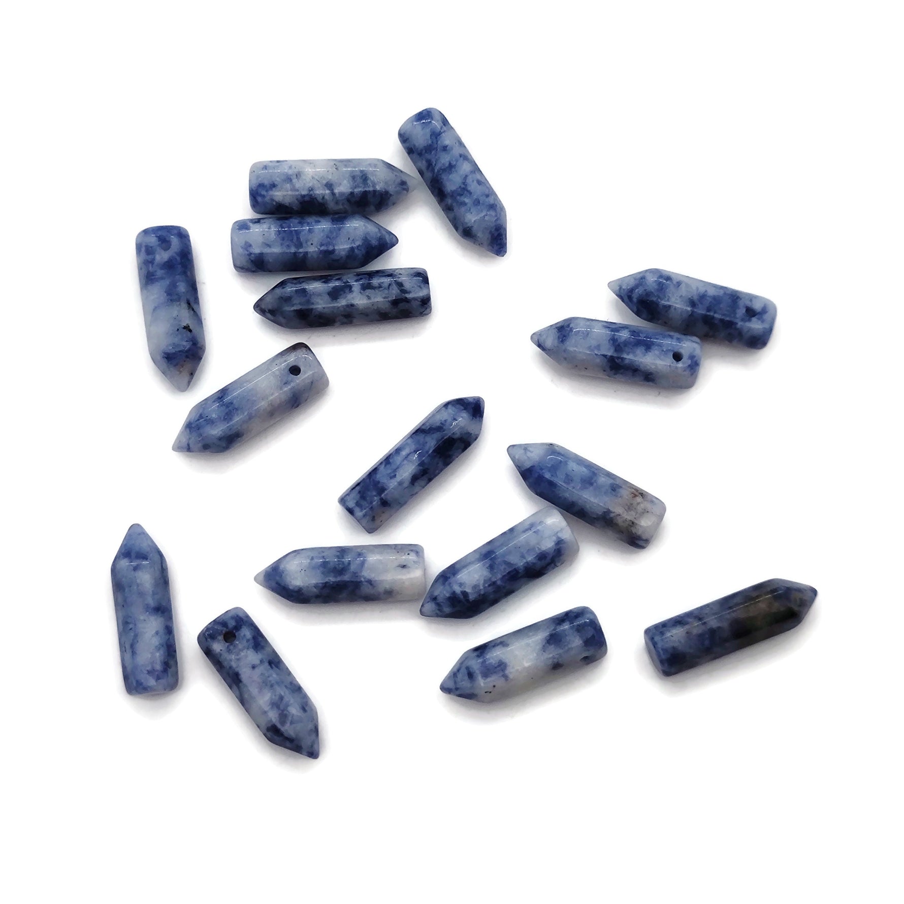 Blue Spot Jasper crystal pendant featuring a drilled point, showcasing vibrant blue spots and natural gemstone details.