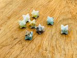 Amazonite Merkaba star crystal for Reiki healing, 13mm gemstone from GemstoneGO, featuring a detailed star-shaped design.