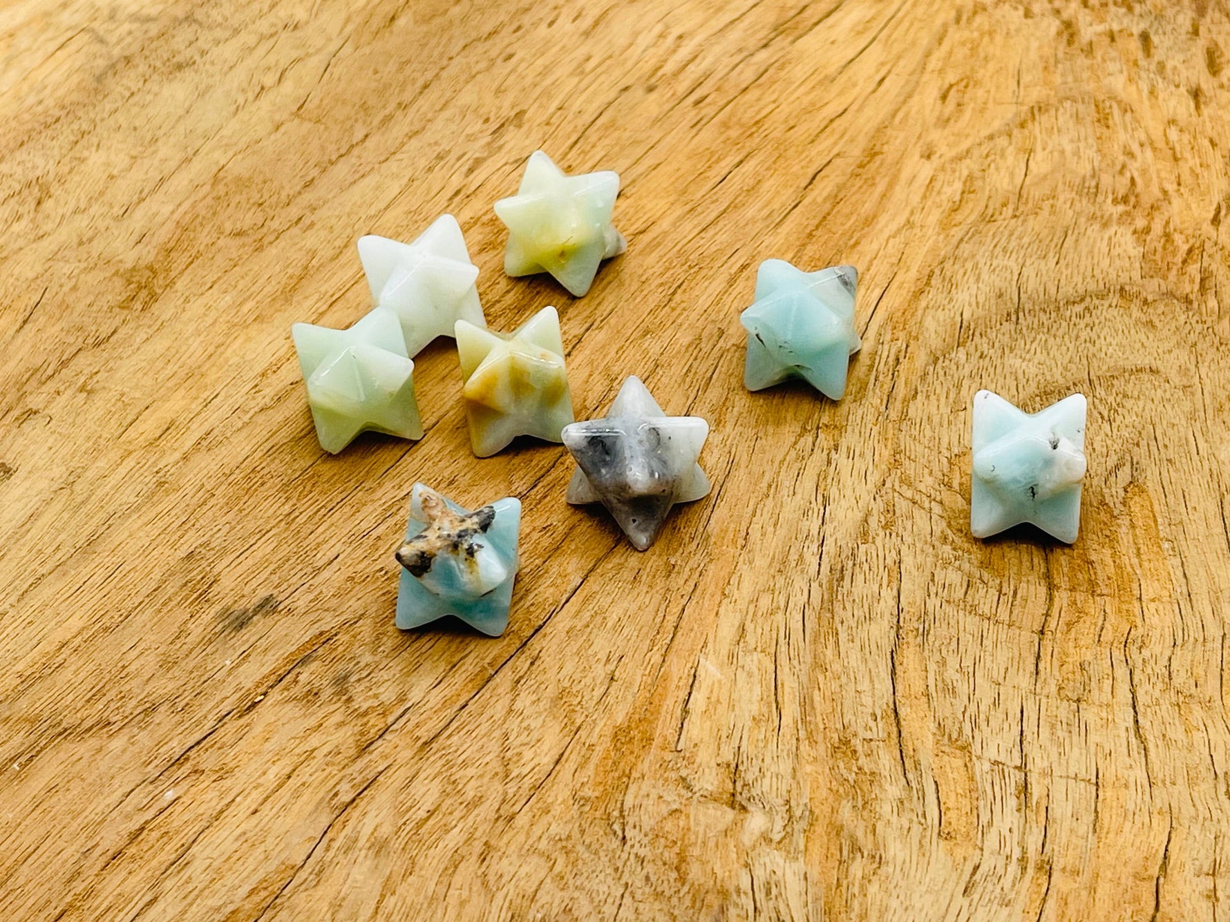 Amazonite Merkaba star crystal for Reiki healing, 13mm gemstone from GemstoneGO, featuring a detailed star-shaped design.