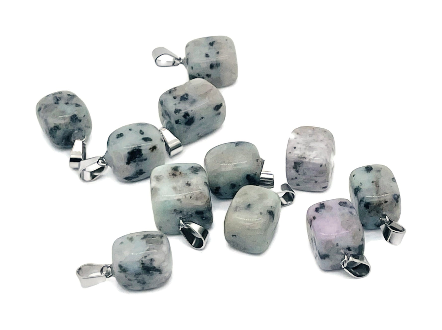 Kiwi Jasper tumbled crystal pendant from GemstoneGO featuring a vibrant green love stone gemstone for jewelry and healing.