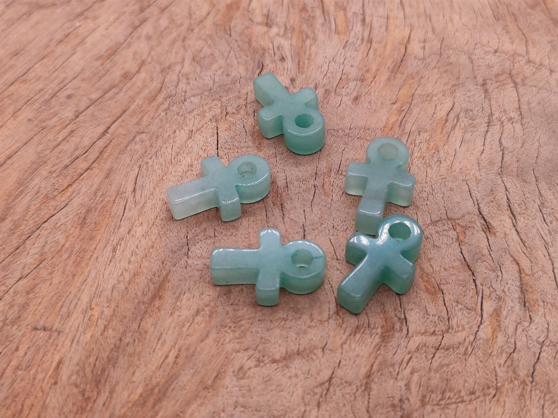 A 30mm Aventurine Anka crystal carving with gemstone Ankh design, showcasing green and natural stone details.