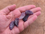 Amethyst angel wing crystal pendant with hole charm, showcasing purple gemstone with detailed wing design, by GemstoneGO.
