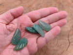 Aventurine angel wing crystal pendant with a hole, featuring a detailed angel wing design, by GemstoneGO.