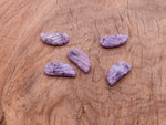 Lepidolite angel wing crystal pendant with hole charm, showcasing purple Lepidolite stone and detailed angel wing design.