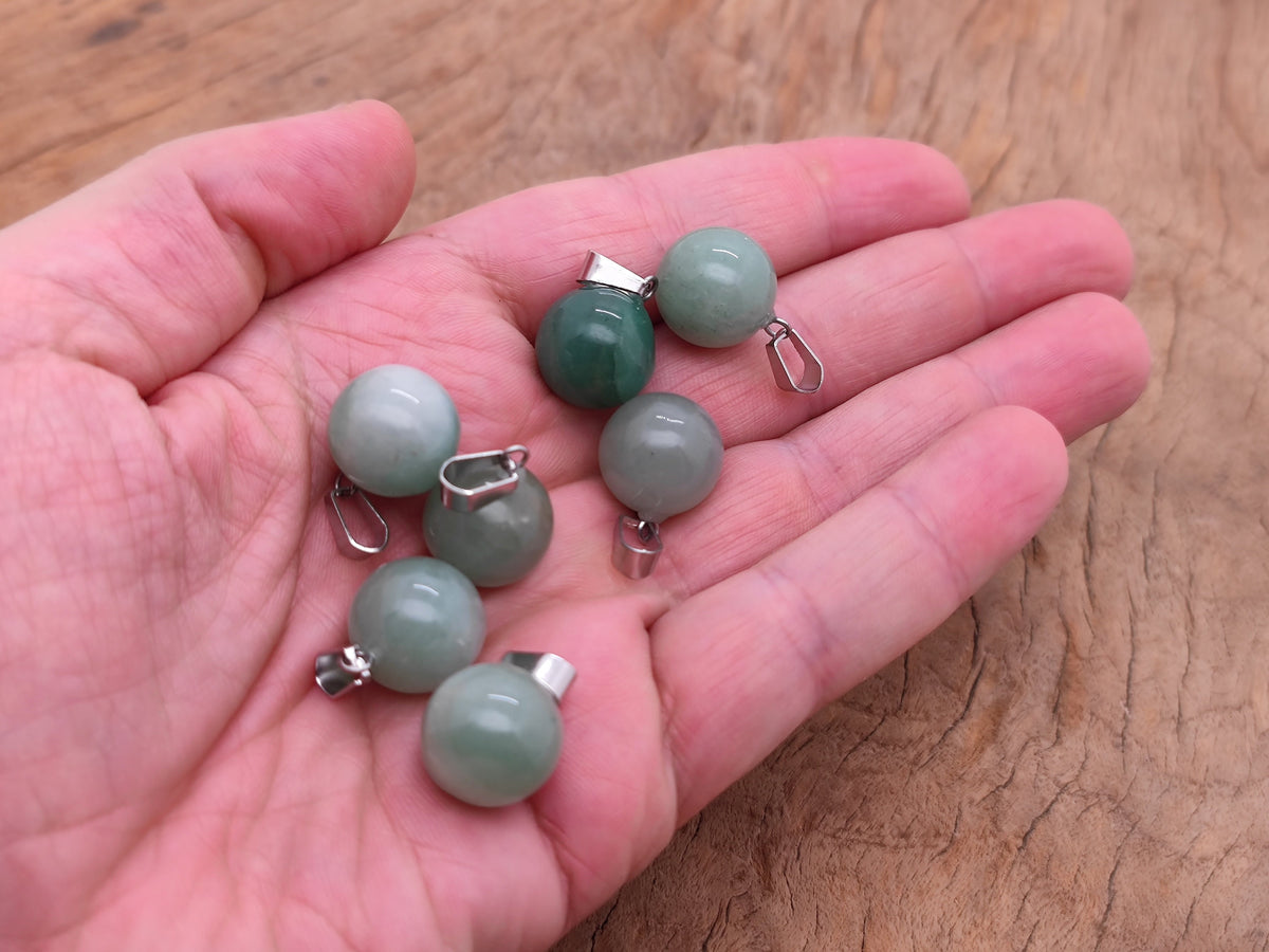Around aventurine crystal ball pendant with a silver loop, suitable for jewelry making, featuring smooth, polished green gemstone.