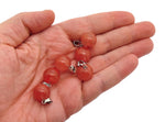 Cherry Quartz crystal round ball pendant from GemstoneGO, ideal for jewelry making, featuring a polished cherry quartz gemstone.