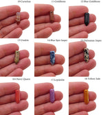 Drilled crystal point pendant with point hole design, featuring a healing stone gemstone from GemstoneGO.