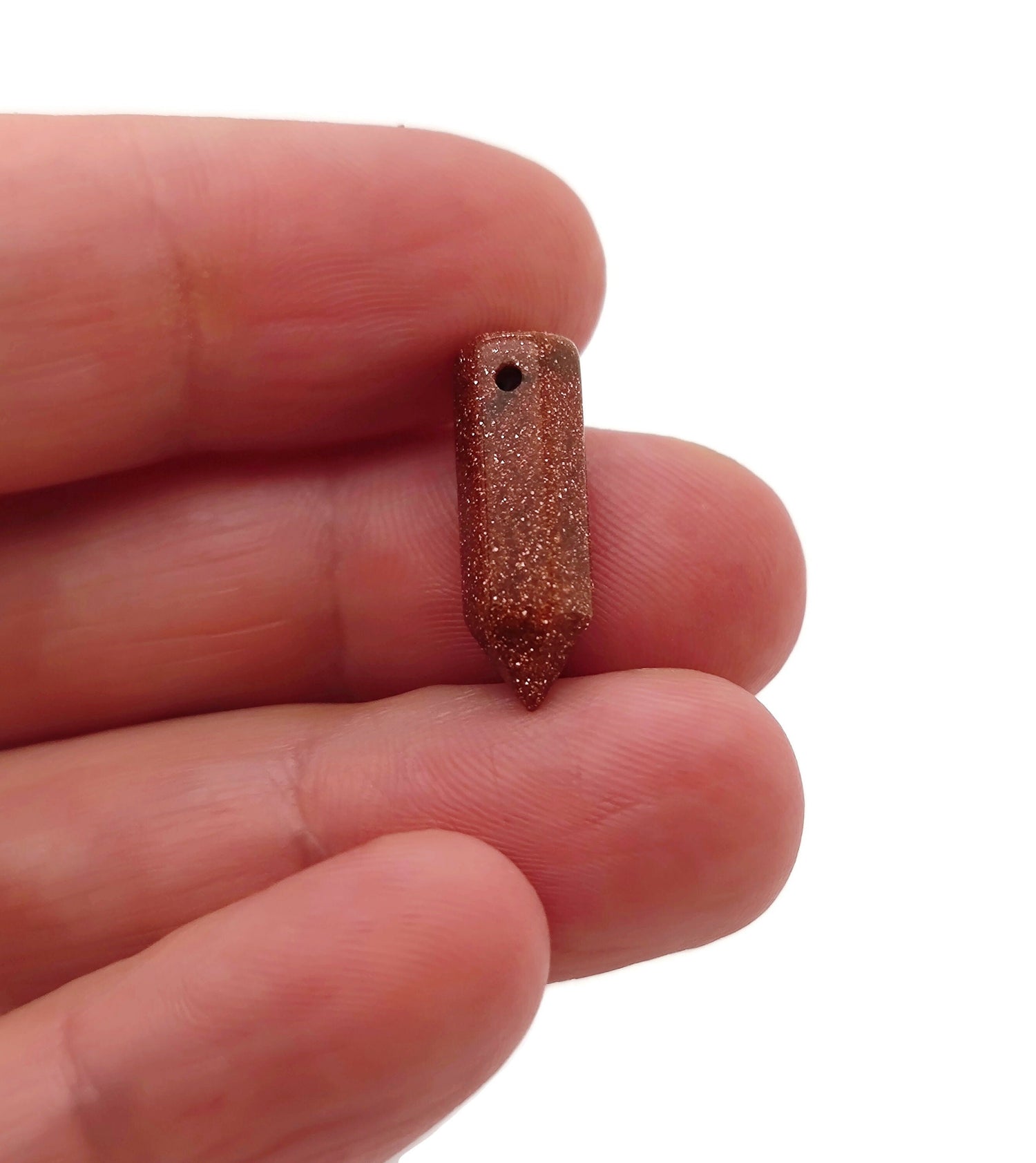Goldstone crystal point pendant with drilled hole, showcasing a sparkling, polished crystal gemstone from GemstoneGO.