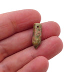 Unakite crystal point pendant from GemstoneGO, drilled gemstone with natural green and pink hues, ready for jewelry making.