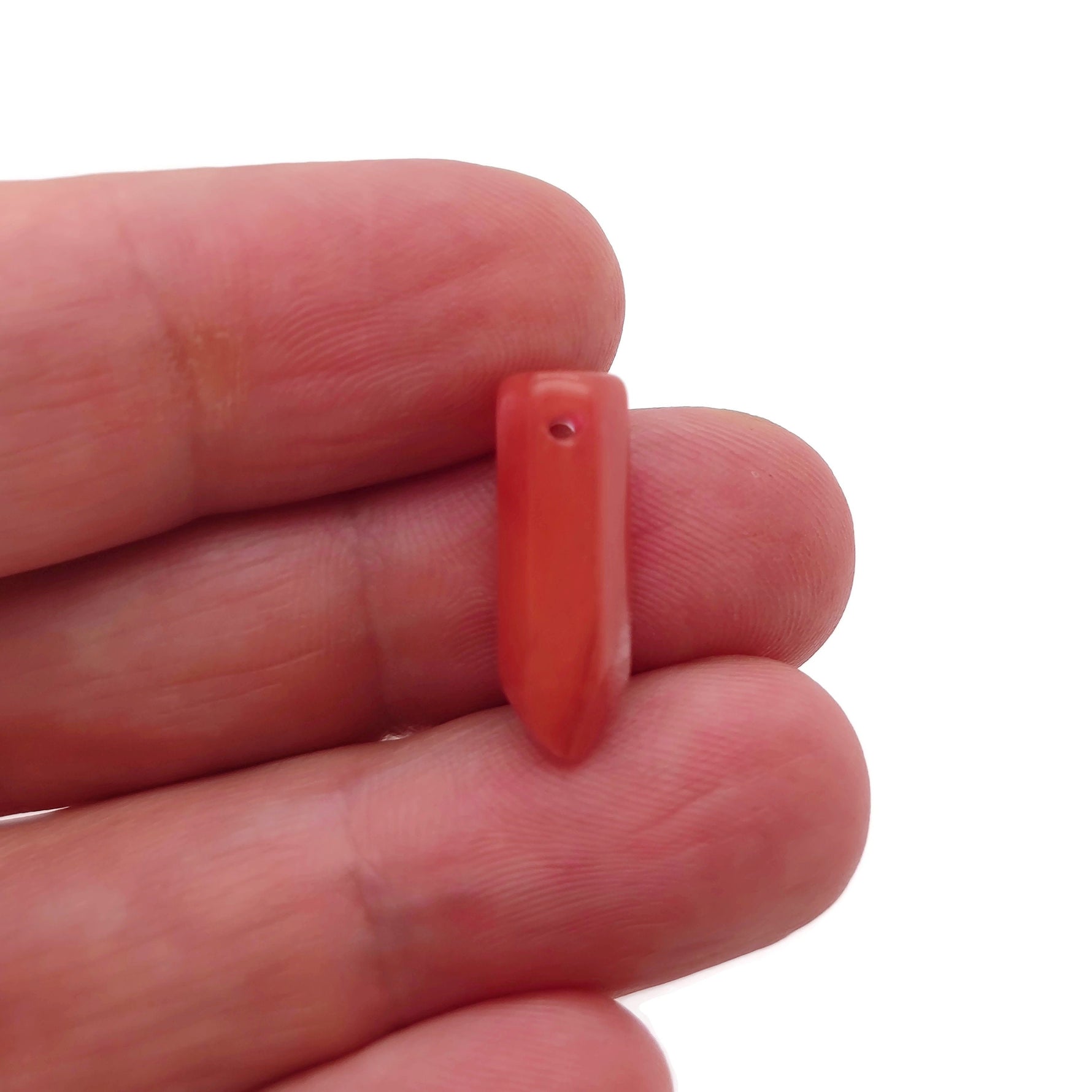 Cherry quartz point crystal pendant featuring a drilled crystal point, showcasing vibrant red color and natural gemstone details.