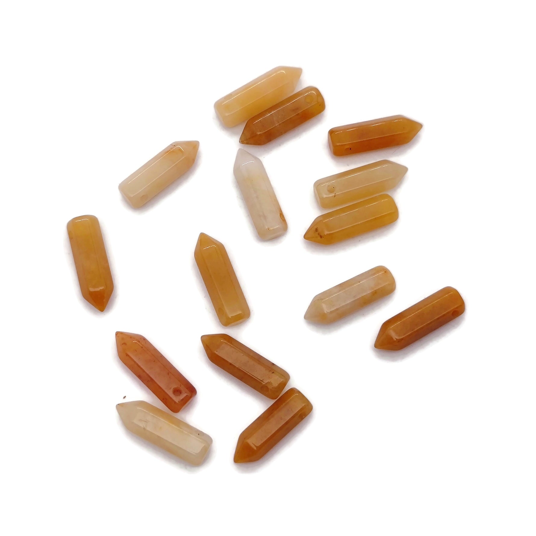 Yellow jade point crystal pendant with drilled hole, from GemstoneGO, showcasing a polished, vibrant yellow gemstone pendant.