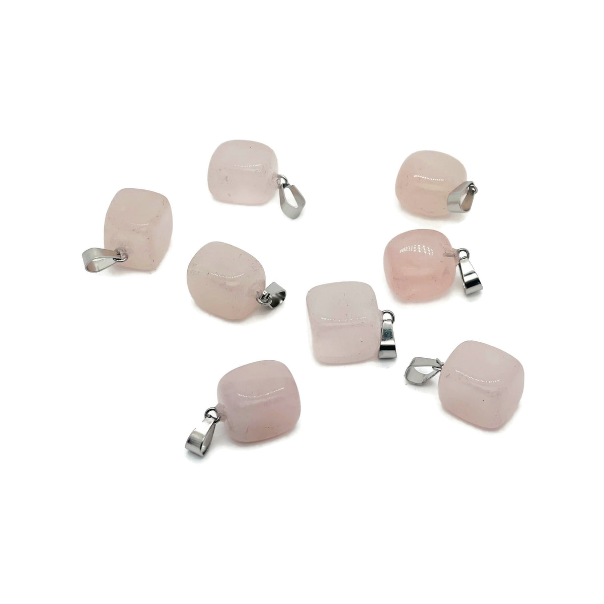 Rose quartz tumbled gemstone pendant from GemstoneGO, featuring a smooth, polished pink stone with a silver bail, close-up view.