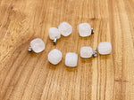 Clear quartz tumbled gemstone pendant from GemstoneGO, featuring a polished love stone design on a silver chain.