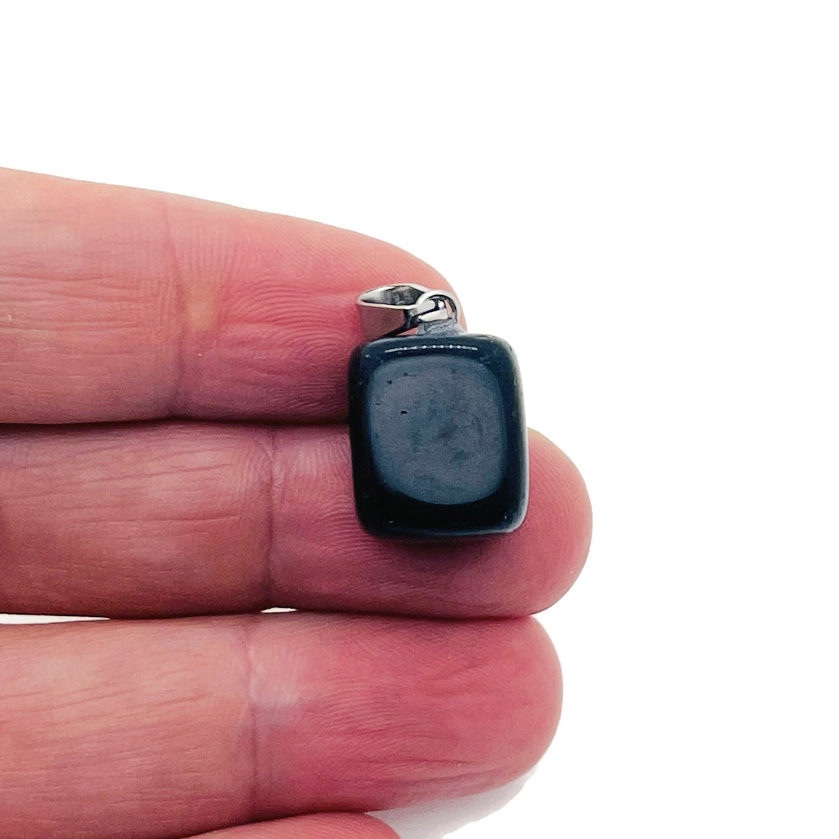 Obsidian tumbled gemstone pendant from GemstoneGO, showcasing a smooth, polished black stone with natural veining on a cord.