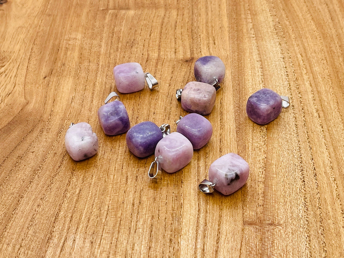 Lepidolite tumbled gemstone pendant from GemstoneGO featuring a smooth, polished purple stone on a silver chain.