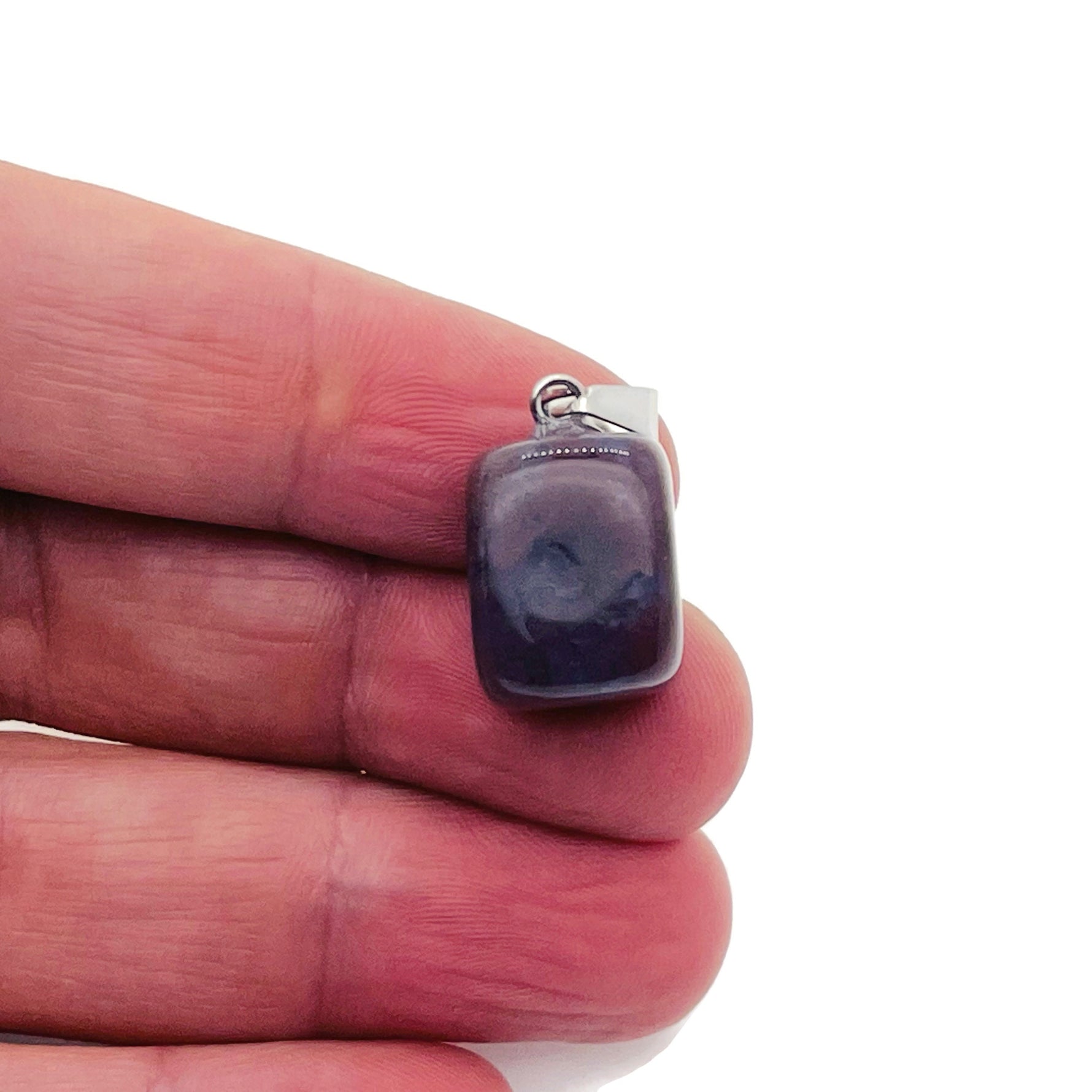 Moss Agate tumbled crystal pendant with natural green and brown patterns, showcasing polished gemstone from GemstoneGO.