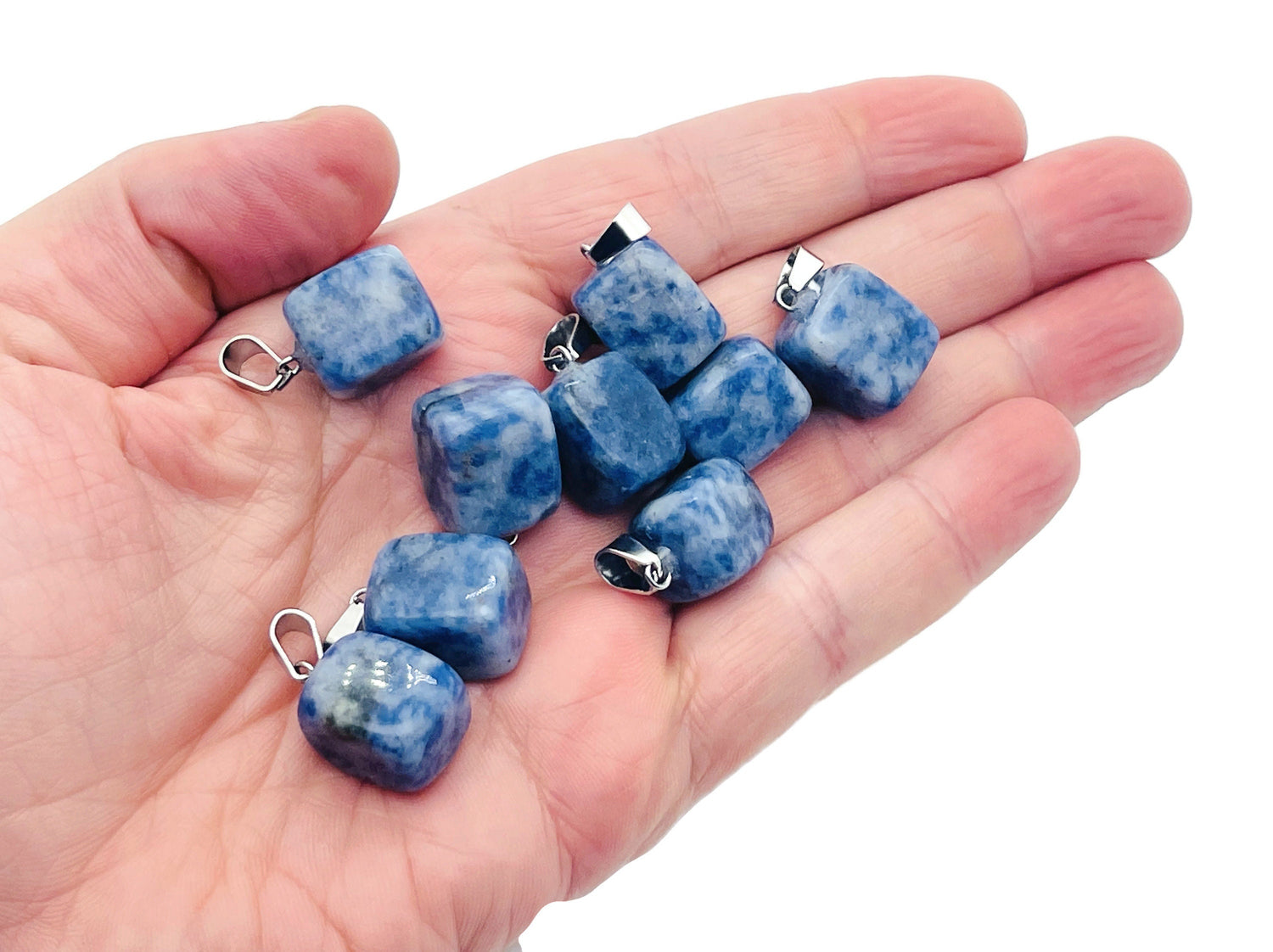 Blue Spot Jasper tumbled gemstone pendant featuring a vibrant blue and brown crystal design, ideal for jewelry and accessories.
