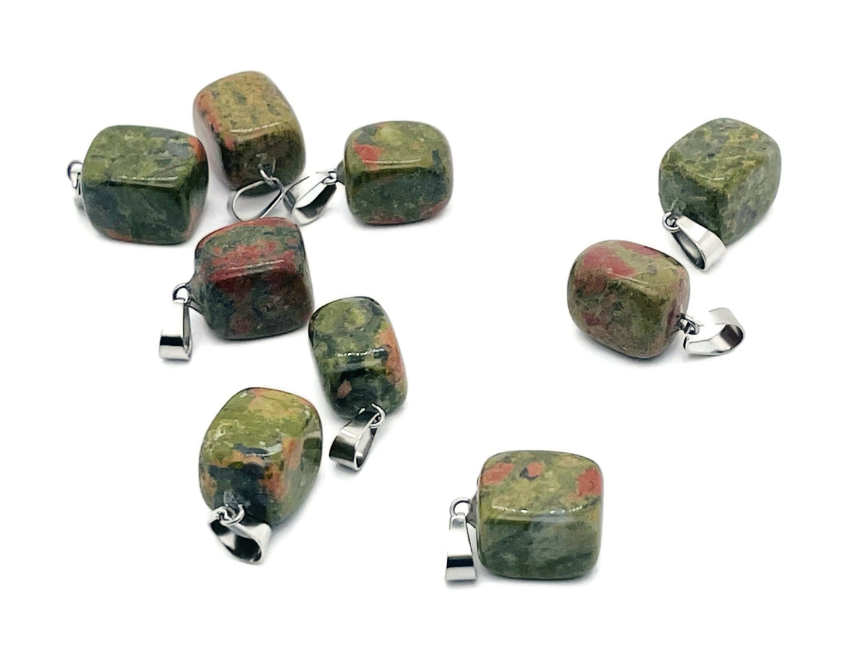 Tumbled gemstone pendant featuring a crystal love stone, handcrafted by GemstoneGO, with a natural polished finish and unique shape.